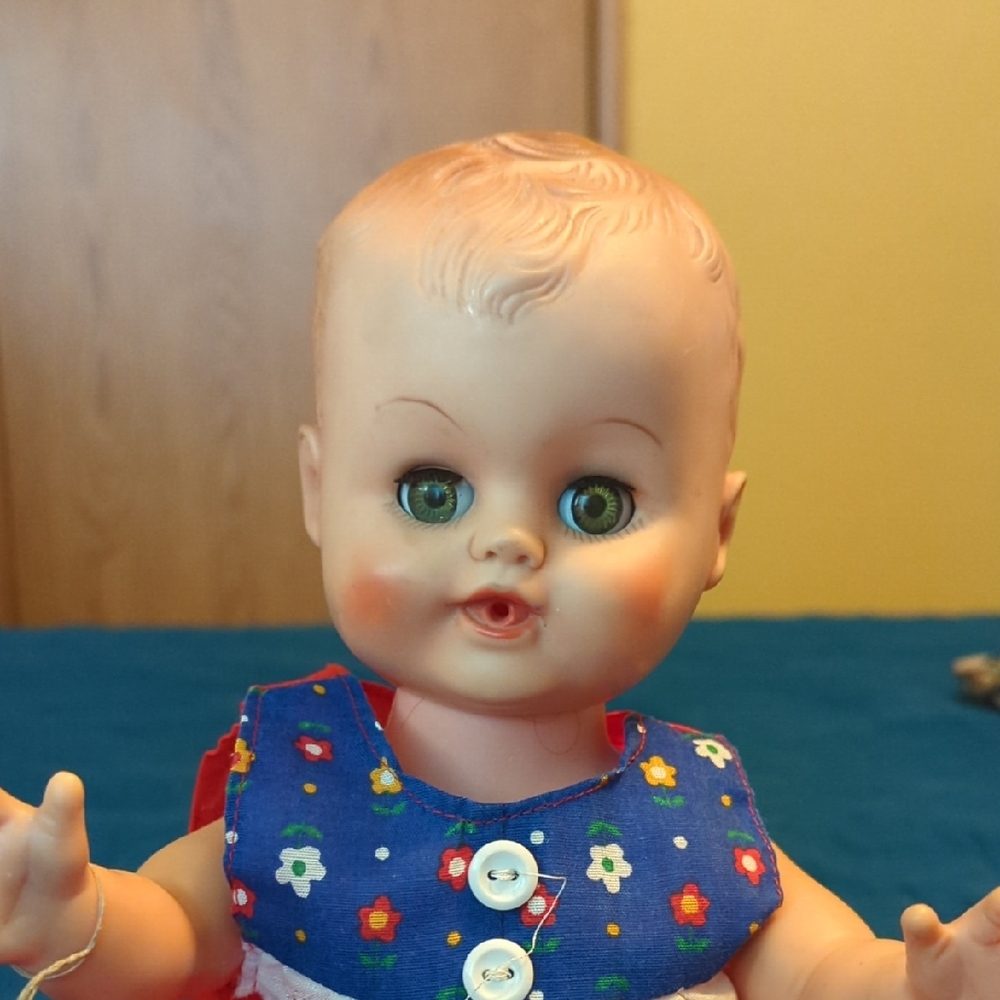Adorable Doll with Blue Floral Dress